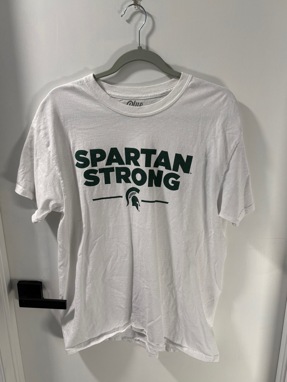 Blue 84 White Tee with Dark Green "Spartan Strong" Graphic